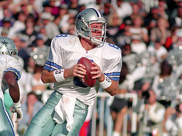 Troy Aikman going back to pass